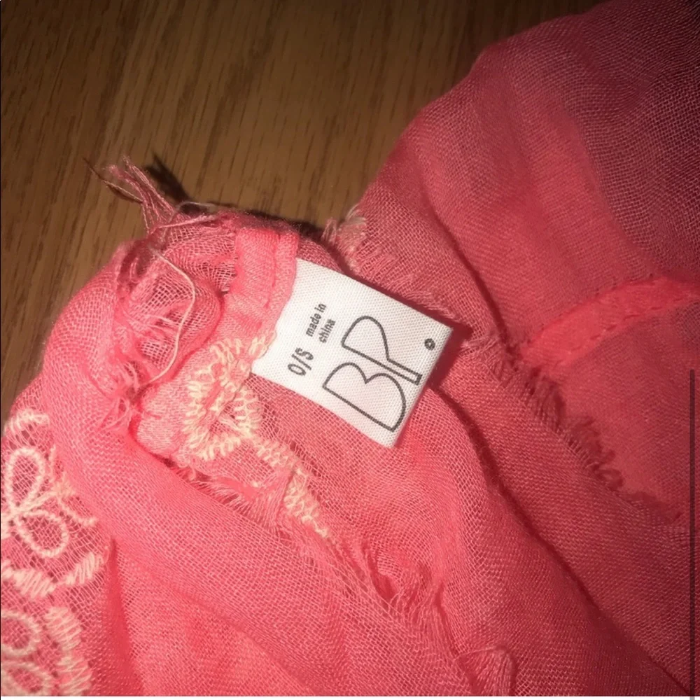 Bundle of two infinity scarves. One hot pink with white lace and one floral.